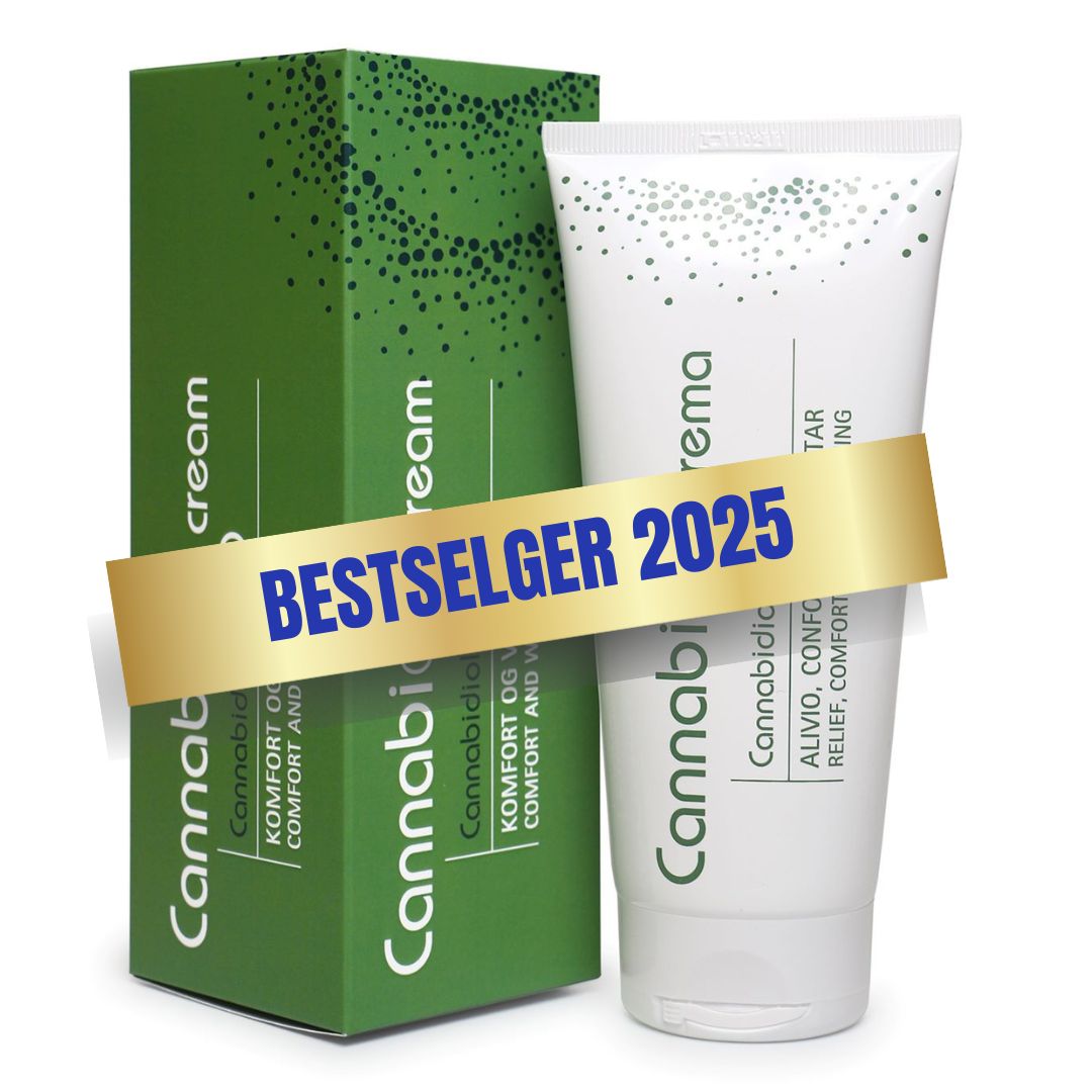 Tube og eske med Muskelkrem på hvit bakgrunn